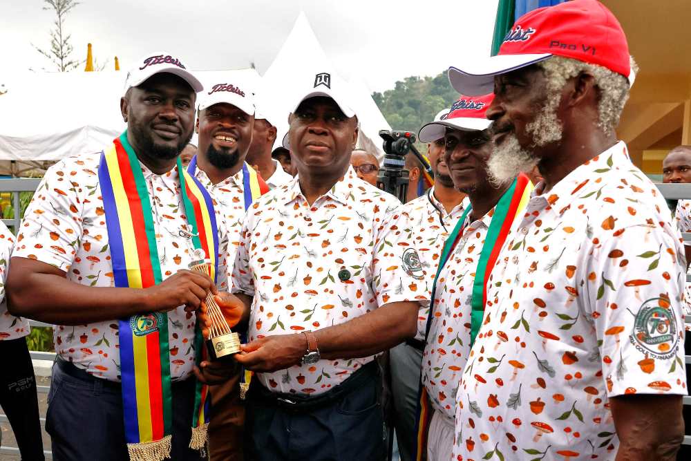 Vice Admiral Emmanuel Ogalla receives a special prize at the tournament
