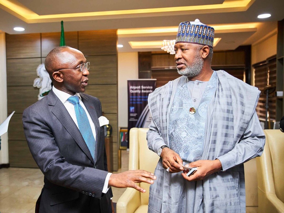 Ministry of Finance Incorporated (MOFI) Chief Executive Officer Dr Armstrong Takang is seen with Honourable Minister of Aviation, Hadi Sirika during a courtesy visit to the minister in Abuja, Tuesday.