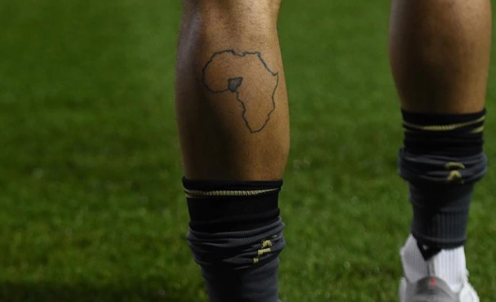 Meet UK-born footballer who tattooed Nigeria's map on his leg